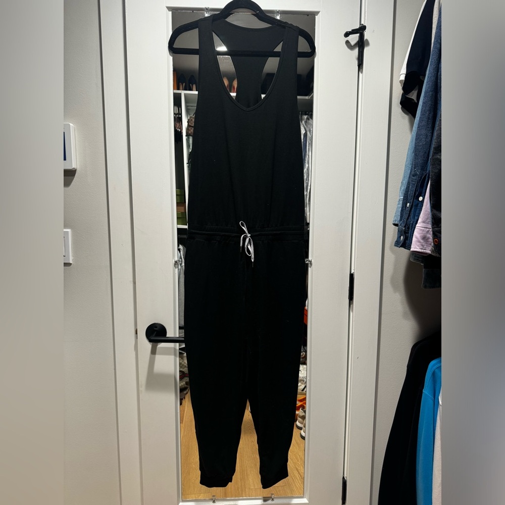 Lightly used large Vuori black jumpsuit.